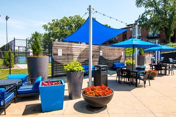 Covered poolside lounge & dining areas